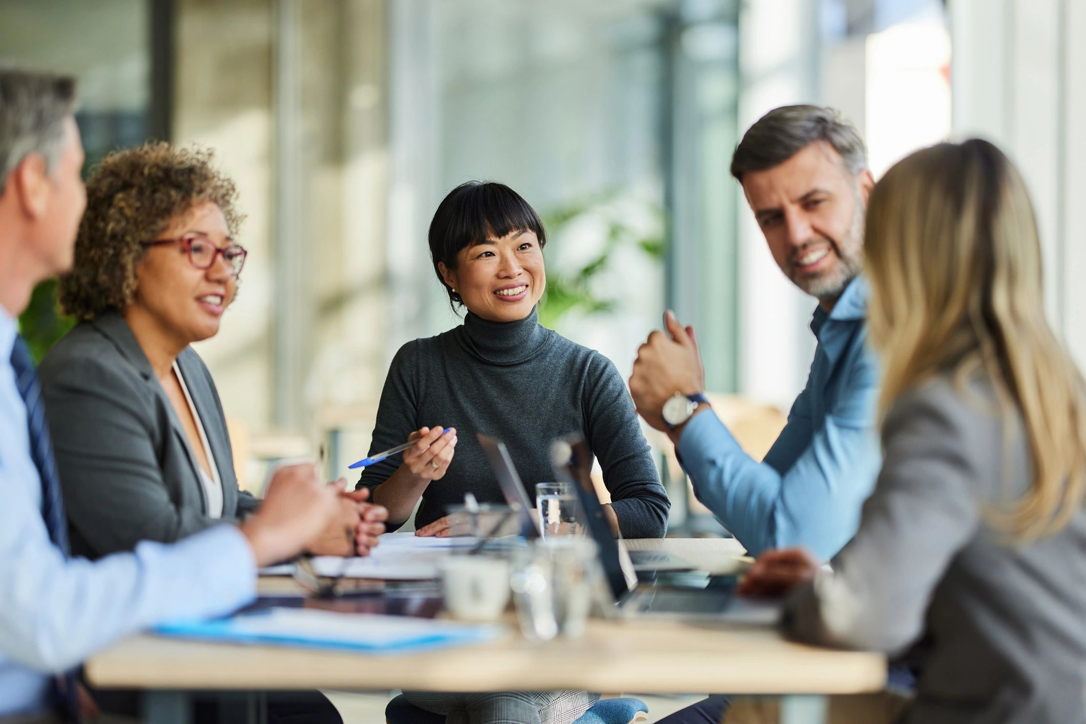 Friendly group meeting representing family-focused discussions